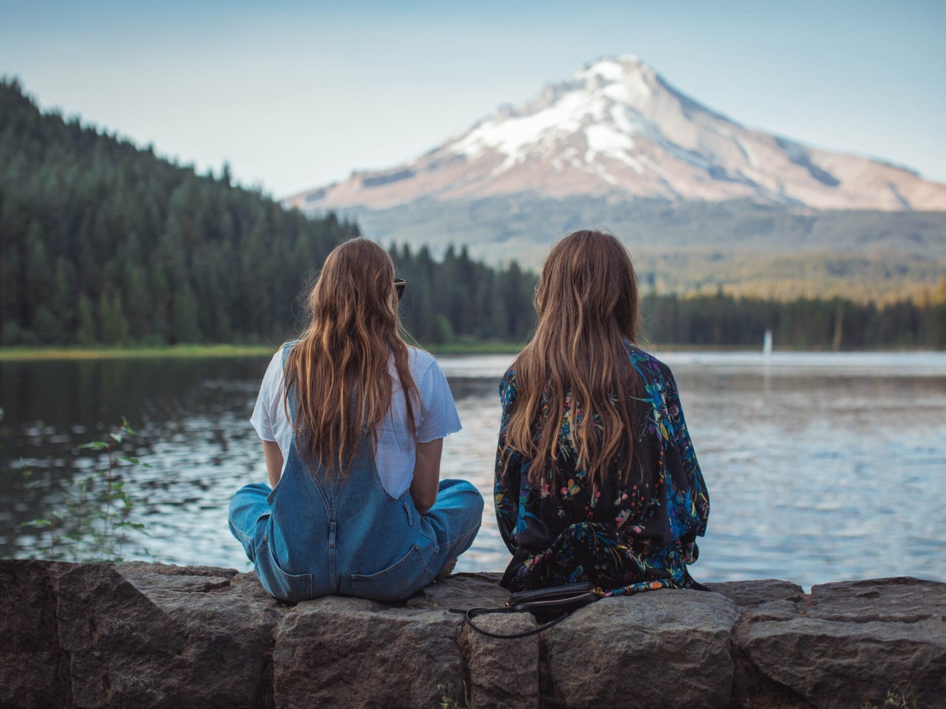 young ladies enjoying mountain scenery