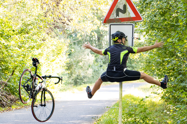 Cyclist hitting road sign head first